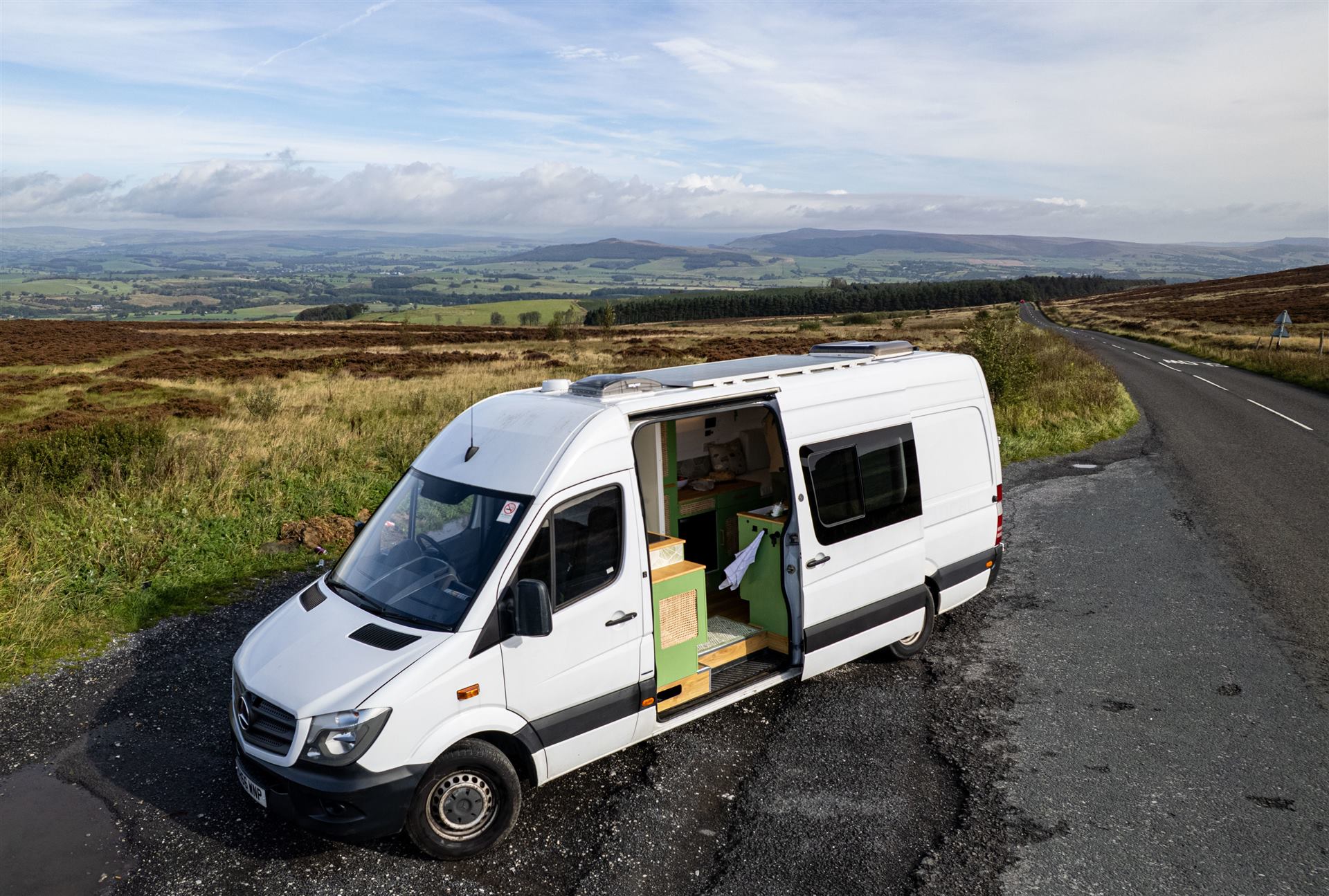 Winnie the hand-built campervan parked in the Lake District